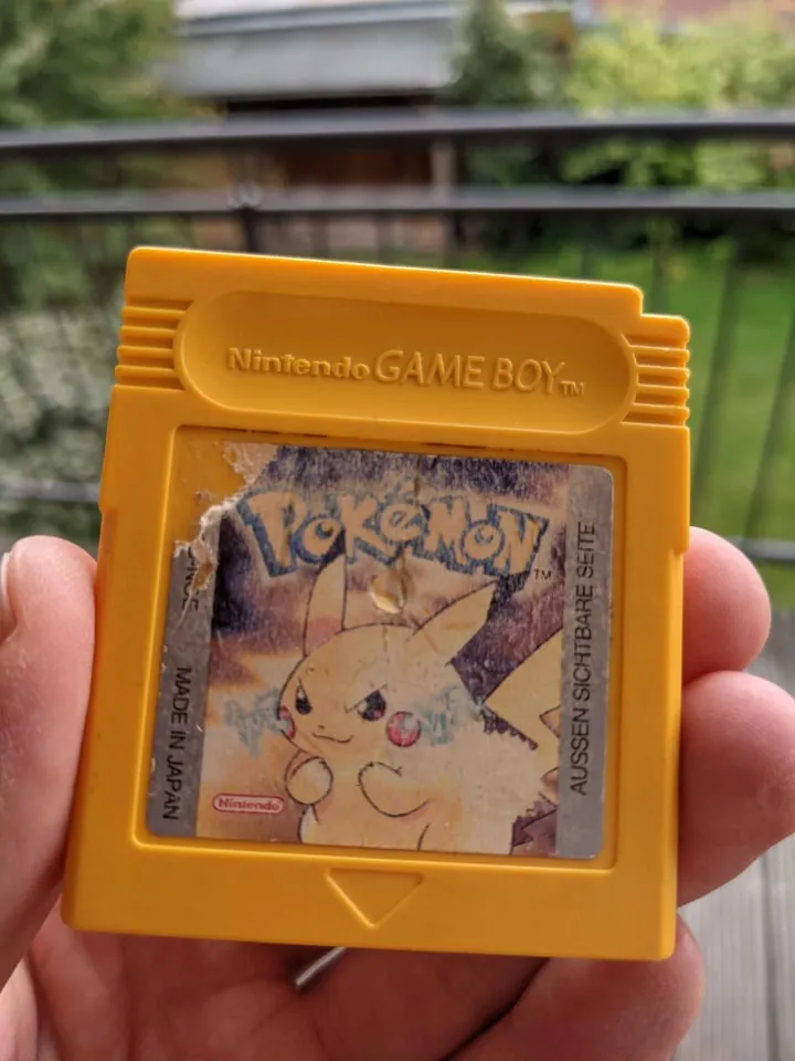 My old Pokémon Yellow Edition held in my hands